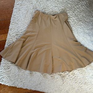 Slimming, versatile Bob Mackie tan skirt L. Stretch waist. Lined. Mixed blend.